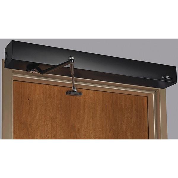 Automatic door operator with arm mounted on a commercial wood door